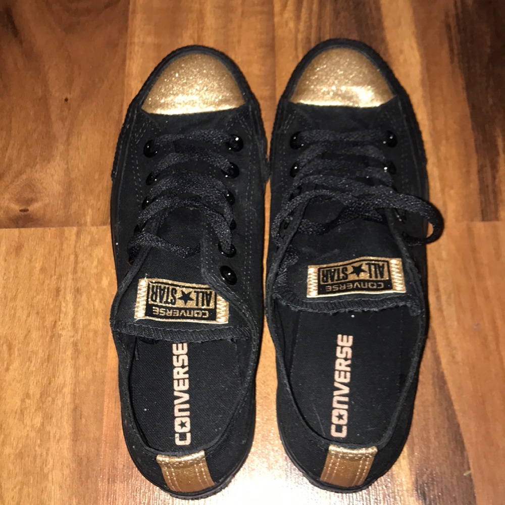 Black and gold converse